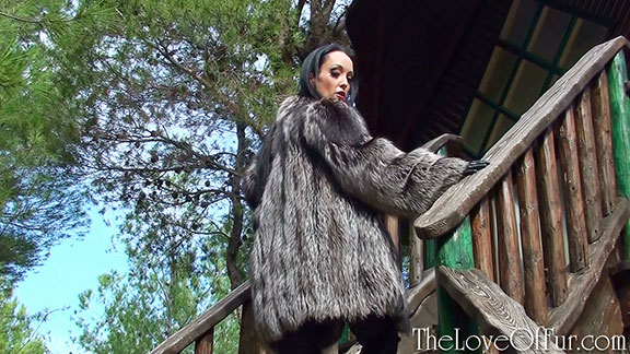 Mistress Fetish Liza in silver fox jacket and black leather boots walks in public